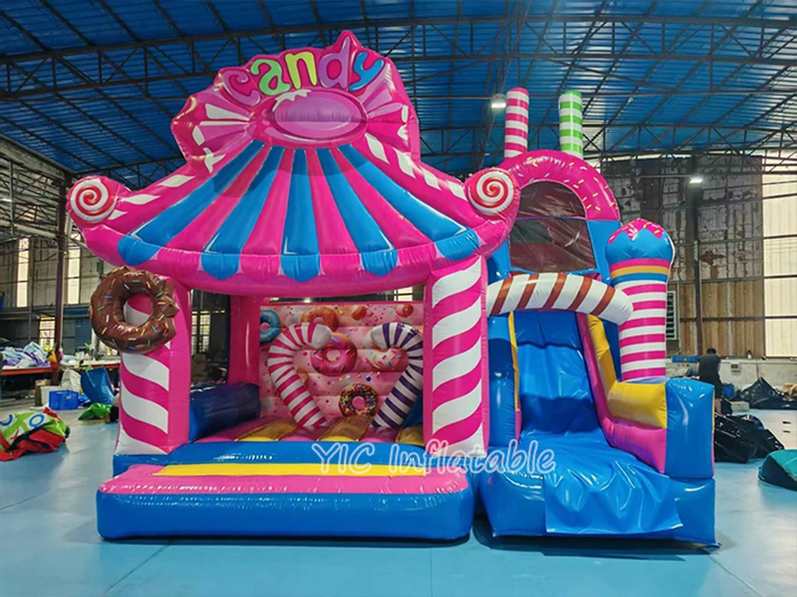 candy themed inflatable bounce-and-slide attraction front view