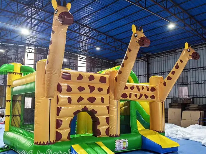 giraffe themed inflatable bounce-and-slide attraction detail view