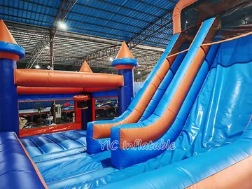 rainbow themed inflatable bounce-and-slide attraction detail view
