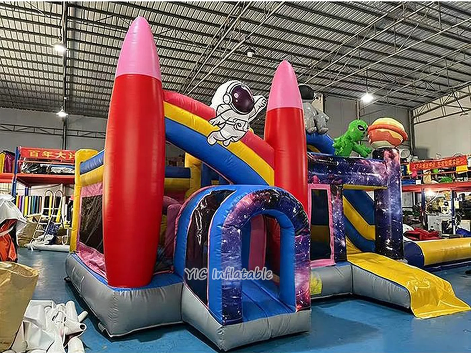 rocket themed inflatable bounce-and-slide attraction front view