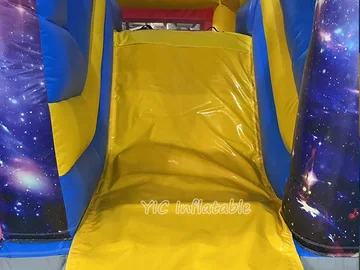 rocket themed inflatable bounce-and-slide attraction detail view