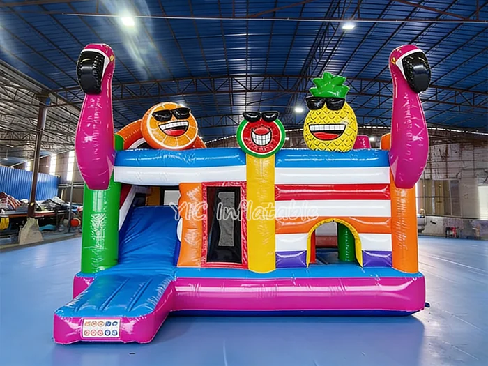 tropical themed inflatable bounce-and-slide attraction front view