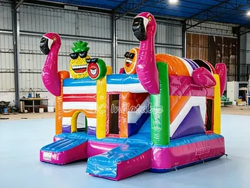 tropical themed inflatable bounce-and-slide attraction detail view