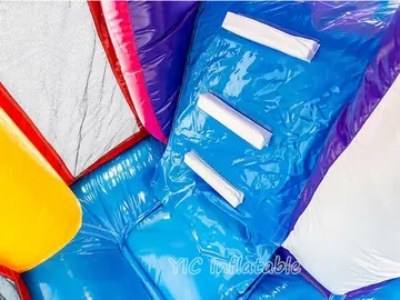 tropical themed inflatable bounce-and-slide attraction detail view