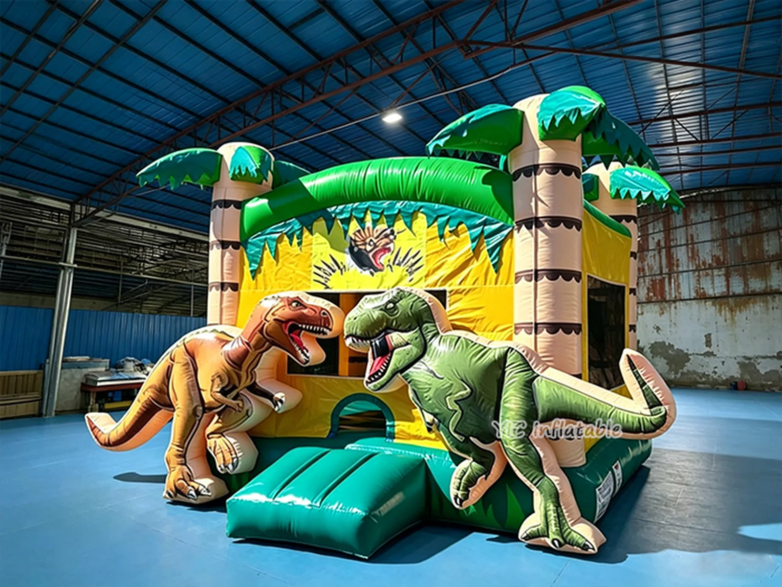 dinosaur themed inflatable jumper front view
