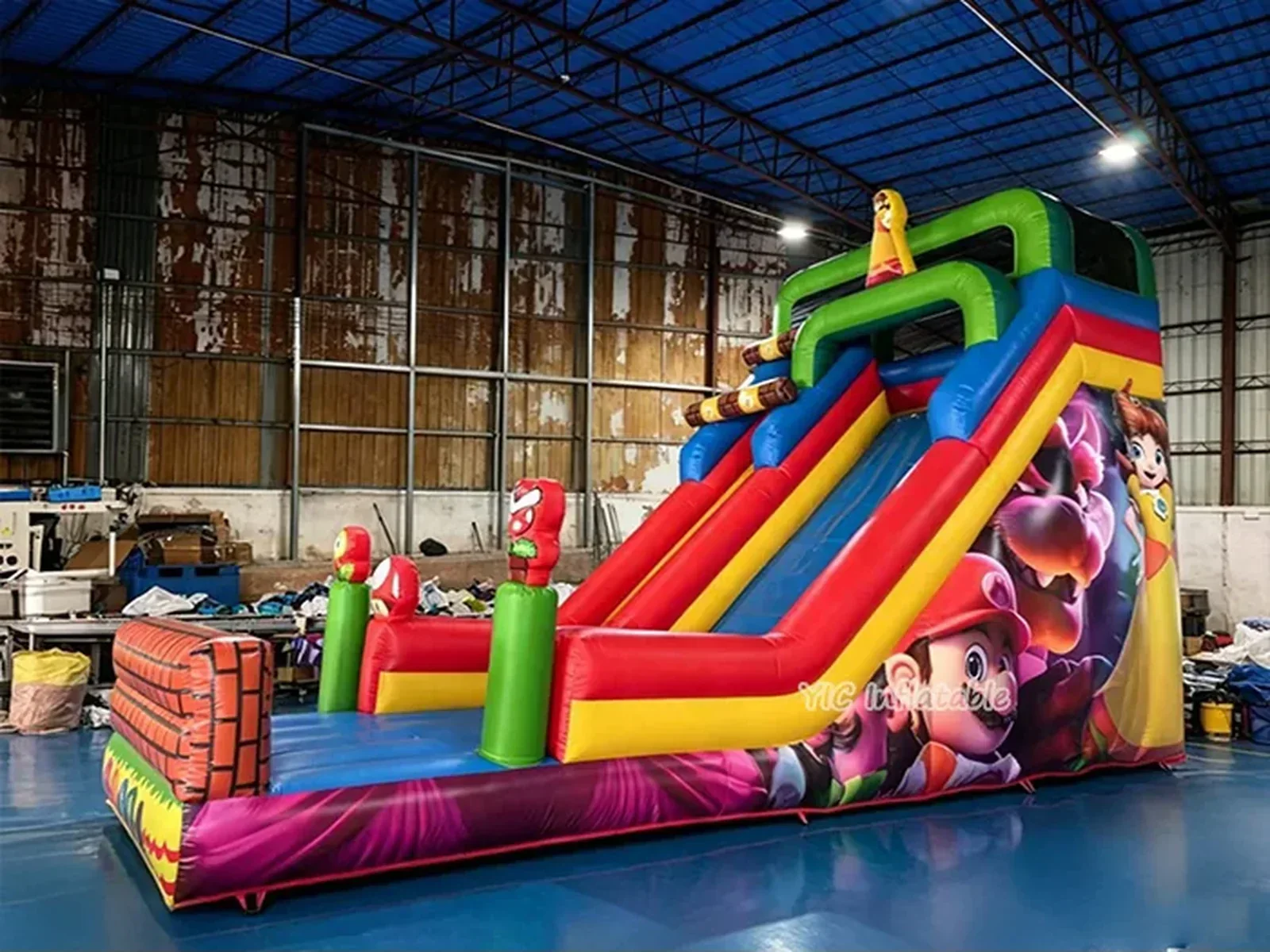 super mario themed standalone inflatable slide front view