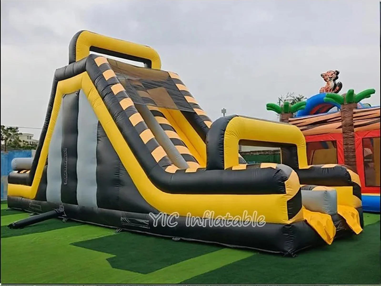 Commercial Black and Yellow Inflatable Slide front view