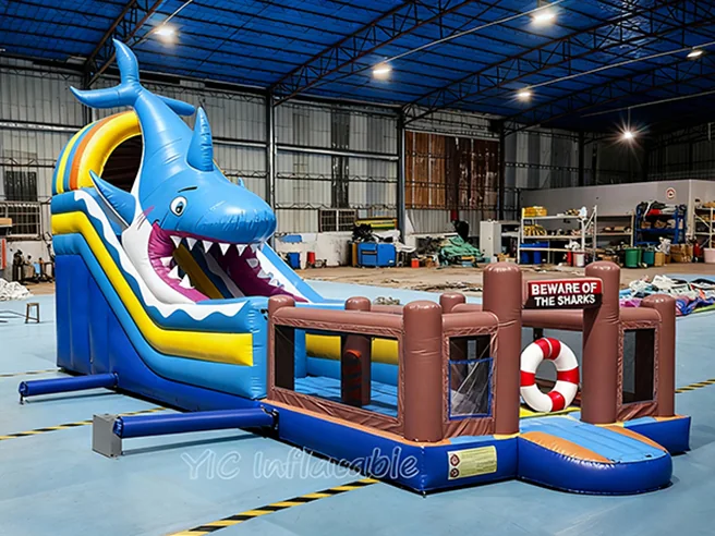 shark themed inflatable challenge course front view